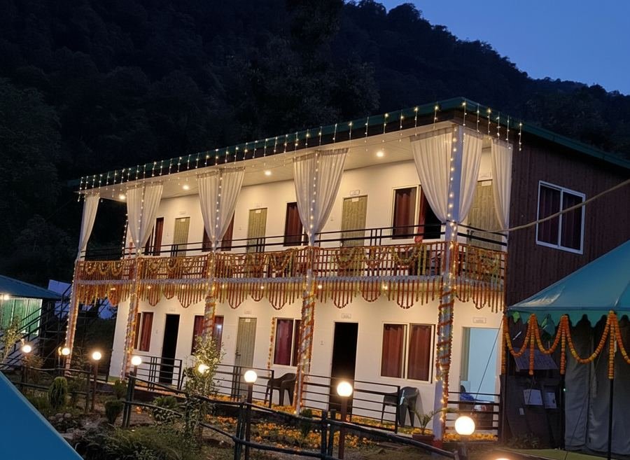 Resort lit with marigold garlands for a wedding