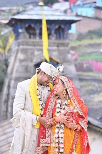 Couple sharing a moment at Triyuginarayan temple